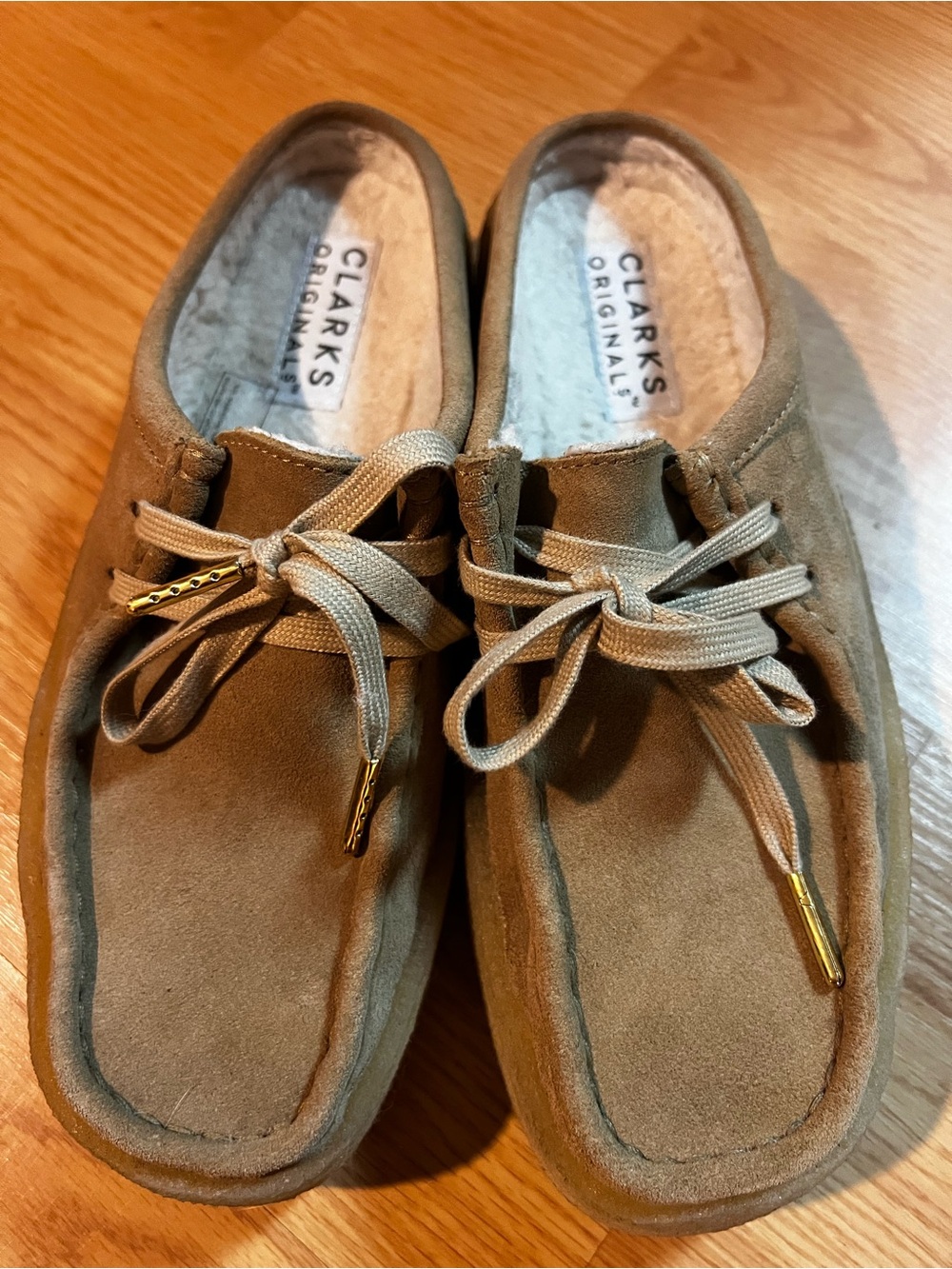 Clarks Women's Tan Suede Wallabee lo Mules with fleece.